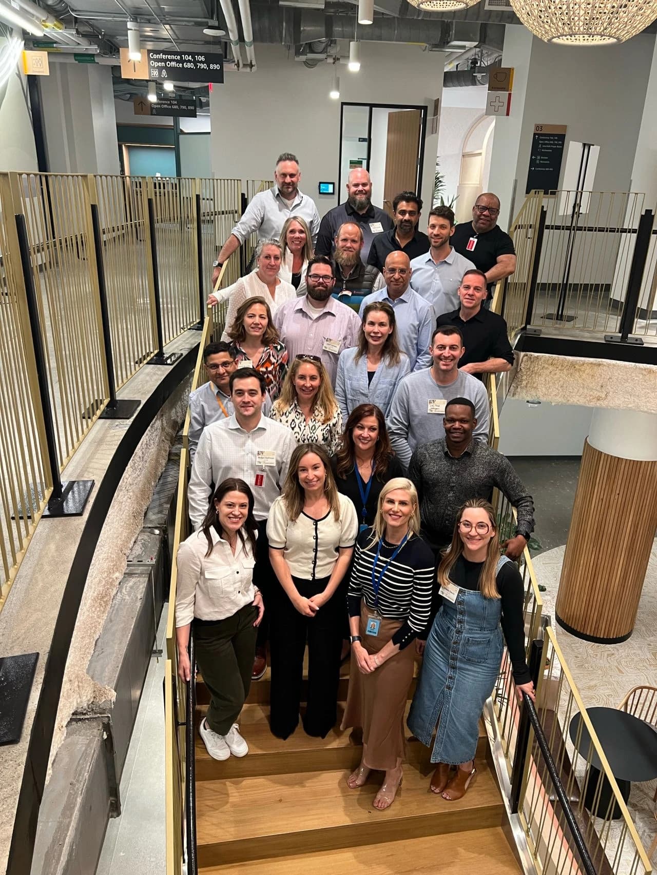 Dico with the AWS workshop cohort on the staircase