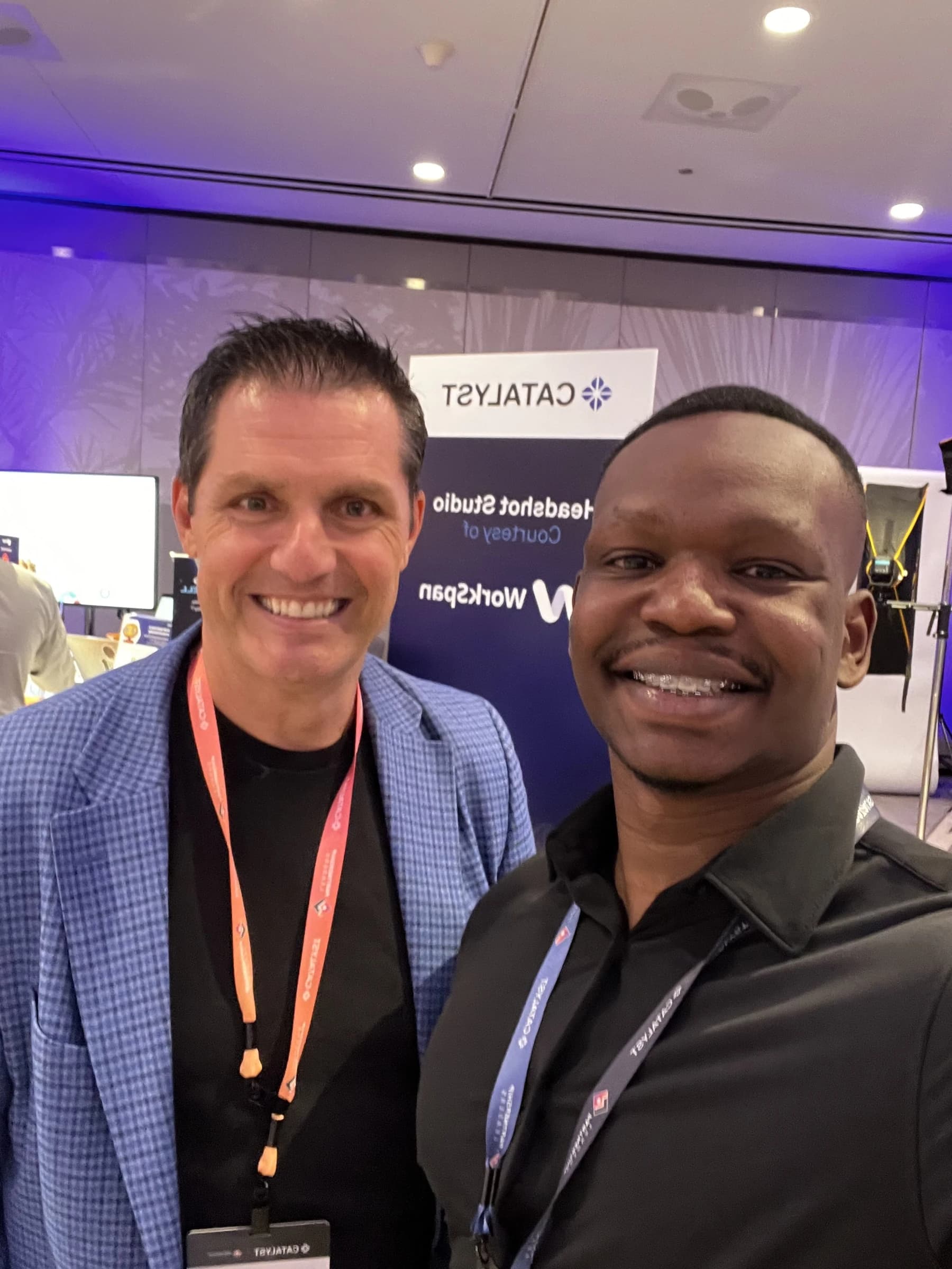 Dico with a partner at a tech event