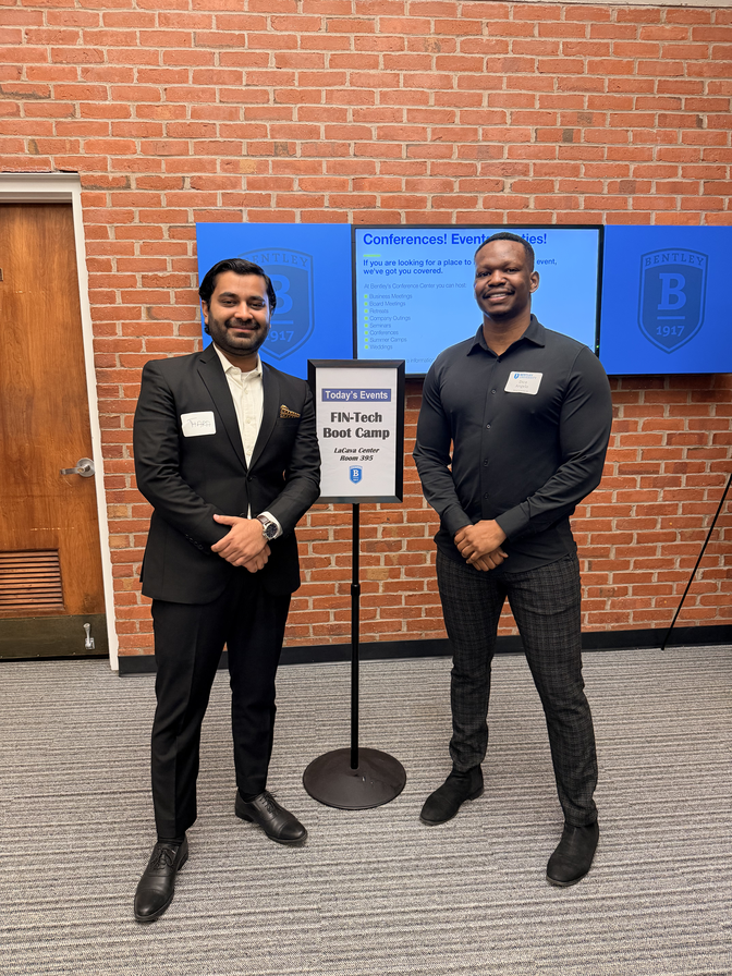 Dico with another attendee at a fintech boot camp